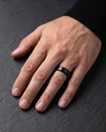 Man wearing the Sarveni Slate brushed black steel ring