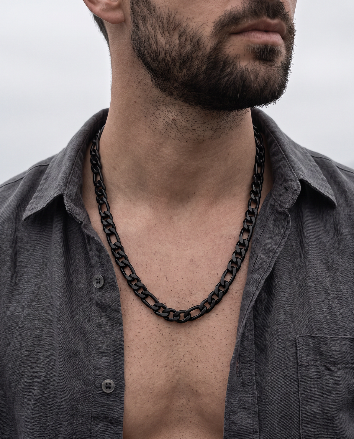 Corvus Chain - Matte Black Figaro worn around the neck